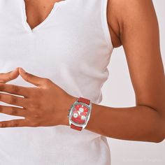 The Aqua Master Ladies Bubble Diamond Watch 0.30ct Red is a stunning timepiece that is sure to make a statement. This watch features a stainless steel case with a diameter of 32mm and a red dial with a bubble pattern. The watch is powered by a Japanese quartz movement and features a chronograph, date indicator, second hand-indicator, and single time zone. The watch is also water-resistant up to 30 meters and is adorned with 0.30ct of diamonds.

The watch is perfect for any occasion, whether you' Luxury Red Watch With Rectangular Dial, Modern Red Watch With Rectangular Dial, Modern Red Rectangular Watch, Modern Red Watch Accessories With Subdials, Luxury Red Analog Display Watch, Modern Red Watches With Subdials, Red Analog Watch For Formal Occasions, Red Watch Accessories With Subdials As A Gift, Formal Red Analog Watch