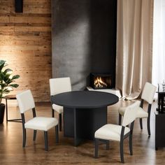 a black table with four white chairs around it and a fireplace in the back ground