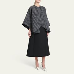 Valentino "Toile Iconographe" poncho in leather, virgin wool, and cashmere Open front  Leather trim  Made in Italy Cashmere Poncho, Bergdorf Goodman, Top Designers, Leather Trim, Valentino Garavani, Leather Trims, Tops Designs, Cashmere, In Italy