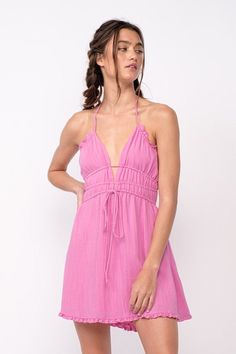 We're dreaming of a beautiful sunny day, and it starts with the Kristen Pink Halter Mini Dress! A cutout tie bodice with a plunging V-neckline meets a strappy, open back and an elastic waistband. The attached mini-skirt has an elastic waist. DETAILS & CARE 80% Rayon, 20% Polyester/LINING: Polyester. Hand wash cold or dry clean. Imported. Cute Pink Dress, Plunge Mini Dress, Beautiful Sunny Day, Boho Pink, Plunge Dress, Halter Mini Dress, Pink Boho, Dress Boho, Pink Mini Dresses