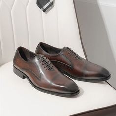 Introducing the ExoticaLux Pointed Toe Brogue Shoes, crafted with genuine cow leather for the utmost sophistication and style. With a pointed toe shape and lace-up closure, these shoes exude elegance and ensure a secure and comfortable fit. The rubber outsole provides excellent traction, making them suitable for any occasion. Elevate your style to new heights with the timeless and versatile ExoticaLux Pointed Toe Brogue Shoes. Order your pair today and step into a world of sophistication. Brown Fitted Pointed Toe Dress Shoes, Fitted Brown Dress Shoes With Pointed Toe, Brown Fitted Dress Shoes With Pointed Toe, Fitted Brown Lace-up Oxfords, Fitted Brown Oxfords With Pointed Toe, Brown Pointed Toe Oxfords With Brogue Detailing, Brown Oxfords With Brogue Detailing And Pointed Toe, Brown Lace-up Oxfords For Business Casual, Brown Brogue Dress Shoes With Pointed Toe