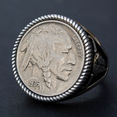 Splendid 925 Sterling Silver Signet Ring - Buffalo Skull Design. Hand-made. Antique style oxidized. The ring is set with a genuine US 1936 Indian Head Buffalo Nickel AU Coin, showing OBVERSE in front - Indian Head. Great detail, nice depth, and beautiful contrast. I only use these coins with readable dates, never try to clean them, and always keep their collectible and numismatic values. I designed and made the ring. The ring is NEW and never used. Ring size: You need to pick a ring size from dr Antique Oxidized Finish Engraved Ring As Gift, Antique Stamped Sterling Silver Rings, Antique Silver Engraved Vintage Rings, White Gold Round Skull Ring Stamped 925, Vintage Engraved Antique Silver Rings, Classic Sterling Silver Skull Ring Gift, Heirloom Nickel-free Jewelry For Collectibles, Heirloom Nickel-free Collectible Jewelry, Classic Sterling Silver Engraved Ring Nickel-free