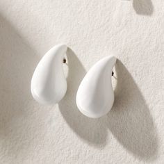 - Enamel with Stainless Steel Base -Hypoallergenic -Lightweight, hollow design for a comfortable experience. A must have statement earrings! Modern White Clip-on Earrings, Trendy White Drop Clip-on Earrings, Elegant White Hypoallergenic Clip-on Earrings, White Hypoallergenic Drop Clip-on Earrings, White Hypoallergenic Clip-on Drop Earrings, Trendy White Pierced Earrings, Hypoallergenic White Drop Clip-on Earrings, Modern White Teardrop Earrings, White Teardrop Clip-on Earrings For Gifts