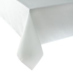 a white table cloth on top of a wooden table