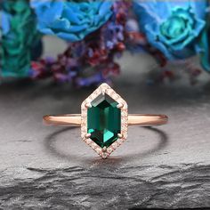 Vintage Bridal Jewelry/ Long Hexagon Cut 5x9mm Emerald Ring/ 14k Solid Rose Gold Ring/ Promise Wedding Ring/ Anniversary Gift Ring For Lover ------------Specifications------------ Engagement Ring: Center Stone - 5x9mm Long Hexagon Cut Lab Created Emerald - 1.10CT Stone Clarity - VVS Stone Color - Green - 5A Side Stones - 0.10ctw Moissanite/Diamond Width of the Band - 1.55mm ------------SIZES------------ This ring is made to order in any size, please drop down the Options box to choose the gold c Rose Gold Emerald Cut Ring For May Birthstone, Octagon Halo Rings For Anniversary, Octagon-shaped Halo Jewelry For Anniversary, Emerald Cut Rose Gold Jewelry With Halo Design, Emerald Cut Rose Gold Halo Jewelry, Octagon Emerald Ring With Halo For Wedding, Halo Octagon Ring As A Gift, Octagon Rose Gold Ring For Formal Occasions, Rose Gold Octagon Ring For Formal Occasions