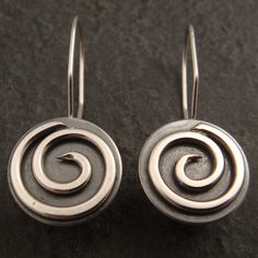 Flat Sterling Spiral Earrings by DownToTheWireDesigns on Etsy Unique Handmade Spiral Earrings, Unique Spiral Wrap Earrings As Gift, Unique Spiral Earrings, Unique Spiral Wrap Earrings For Gift, Unique Swirl Earrings As Gift, Unique Swirl Earrings For Gifts, Minimalist Silver Swirl Earrings, Handmade Spiral Sterling Silver Wrap Earrings, Handmade Spiral Earrings As Gift