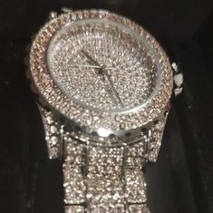 Unisex Bling Watch Stunning Statement Watch Silver Crystal Stainless Steel Bracelet Jewelry Watch Wrist Watch I Received This As Award For Top Avon Recruiting. Never Used 2015 Comes With Black Cushion Pillow In Original Black Box Silver Bling Jewelry And Watches As Gift, Luxury Silver Watch For Parties, Stainless Steel Round Diamond Watch As Gift, Round Stainless Steel Diamond Watch As Gift, Gift Stainless Steel Round Diamond Watch, Gift Round Stainless Steel Diamond Watch, Party Silver Round Diamond Watch, Silver Formal Watches With Bling, Elegant Silver Watch Accessories With Bling