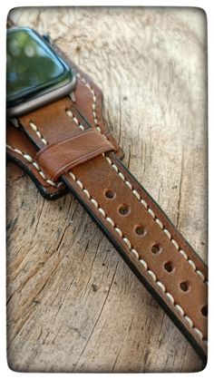 Apple Cuff Watch Band. Genuine Brown Leather Apple Watch Band 38mm - 40mm - 42mm - 44mm - 45 mm - 49 mm * Made usıng genuine leather.  * Productıon stages are manually done from cuttıng to sewıng. every watch band manufactured carrys a personal character, unlıke machıne mass productıon. * A wonderful product that you can use for many years wıthout loseıng ıts qualıty and stylısh or buy as a gıft * Designed for all Apple Watch Series and sizes (38mm - 40mm - 42mm - 44mm - 45 mm - 49 mm ). * LENGTH OPTİONS - Small: 115 mm (4,52") - 75 mm (2,95") - Medium: 115 mm (4,52") - 90 mm (3,54") - Large: 135 mm (5,31") - 90 mm (3,54") * COLOUR OPTİONS - Brown * Stainless steel buckle and adapters come with the watch band. * Watch Buckle and Adapters : Silver colour and Black colour are avaılable * Due Brown Leather Strap Apple Watch Band, Brown Bracelet Strap Apple Watch Band For Everyday Use, Brown Rectangular Watch Strap, Brown Rectangular Wrist Strap For Watches, Classic Brown Rectangular Apple Watch Band, Vintage Adjustable Apple Watch Band Rectangular, Vintage Adjustable Apple Watch Band, Vintage Brown Leather Strap For Apple Watch, Vintage Rectangular Leather Strap Watch Bands