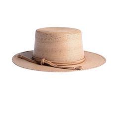 The design of the Carmen hat was inspired by the beach and the palm trees of the Mexican coast. As such, artisan hands braid and interlace palm leaves to create the finished design. It’s completed with a rustic cotton-tied trim, making for an updated take on a classic boater hat. 100% Palm leaf, natural color Medium 58 cm Crown 4” Brim 3” Cordobes crown 100% cotton tied trim Inner elastic Spot/special cleaning Canvas Hat, Spring Hats, Diva Boutique, Boater Hat, Military Hat, Boutique Stores, By The Beach, Casual Hat, Palm Leaf