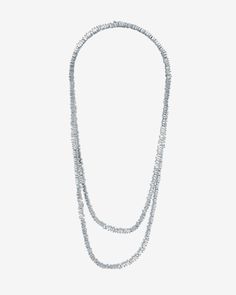 This 36" inch baguette diamond tennis necklace is an easy statement piece that can be paired with any outfit. It is set with 6.75 carats of baguette diamonds that wrap all the way around the necklace in clusters. This necklace can be worn long for a casual look or doubled up to make a lasting impression. Details 18k yellow gold, white gold or rose gold 6.75 carats of baguette diamonds Necklace measures 36" inches in length Box clasp with safety lock fastening 5mm width Ref: BAP716-36 Silver Baguette Cut Necklace For Evening, Silver Necklace With Baguette Diamonds For Evening, Baguette Diamond Necklace, Golden Diamond, Elevated Casual, Diamond Tennis Necklace, Rainbow Sapphires, Diamonds Necklace, Black Sapphire