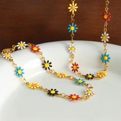 Introducing the ultimate expression of bohemian elegance: our Bohemian Flower Stainless Steel Jewelry Necklace and Bracelet. This vibrant duo is designed for women who want to add a touch of flair and color to their wardrobe. Crafted with meticulous attention to detail, this jewelry features a stunning flower motif enriched with colorful oil dropping accents, making each piece a unique work of art. Product Features Our jewelry is thoughtfully crafted with high-quality stainless steel, ensuring d Bracelet Combo, Bohemian Flower, Colorful Necklace, Bohemian Flowers, Small Animal Supplies, Flower Motif, Necklace And Bracelet, Waist Bags, Colourful Necklace