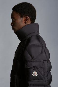 Find MONCLER COLLECTION Vezere Short Down Jacket on Editorialist. Providing warmth, while maintaining a light weight, the Vezere down jacket is crafted from longue saison. The short puffer is enhanced with a hood, easily detached depending on the weather. The jacket's silhouette and patch pocket on the sleeve nod to the iconic Moncler Maya. Designer Black Nylon Outerwear, Luxury Black Duck Down Outerwear, Fitted Black Duck Down Outerwear, Luxury Down Outerwear With Pockets, Luxury Nylon Outerwear For Outdoor, Designer Nylon Outerwear For Outdoor, Designer Nylon Puffer Jacket With Padded Collar, Luxury Down Outerwear For Streetwear, Luxury Duck Down Outerwear With Padded Collar