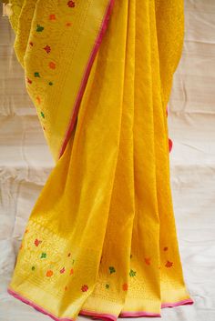 Experience the luxurious elegance of our Katan Silk Tanchoi Sarees, handcrafted with intricate Banarasi designs and premium Katan silk fabric. Available in a range of colors and styles, these sarees are the perfect choice for any special occasion Yellow Semi-stitched Handloom Saree, Yellow Handloom Pre-draped Saree For Wedding, Festival Paithani Silk Pre-draped Saree With Zari Work, Festival Paithani Silk Pre-draped Saree With Cutdana, Paithani Silk Pre-draped Saree For Traditional Ceremonies, Traditional Pre-draped Paithani Silk Saree, Festive Yellow Tussar Silk Pre-draped Saree, Yellow Tussar Silk Pre-draped Saree For Diwali, Festive Yellow Paithani Silk Pre-draped Saree