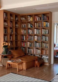 a living room filled with lots of books