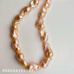 One picture corresponds to one product. Natural Golden Flame Aurora Baroque Pearl Necklace Size: W 14mm-18mm L 24mm-31mm Pearl color: Natural Golden Holes: go though The luster and shape of this batch of golden baroque pearl necklaces are very pretty. I hope to provide high-quality services for your pearl jewelry design. Pink Pearl Necklace With Colorful Round Beads, Pink Round Pearl Beads, Pink Pearl Necklace For Gift, Pink Round Beads Pearl Necklace For Gift, Pink Polished Pearl Necklace For Gift, Pink Pearl Necklace With Round Beads For Gift, Pink Polished Beads Pearl Necklace As A Gift, Pink Polished Beads Pearl Necklace For Gifts, Pink Polished Bead Pearl Necklace For Gifts