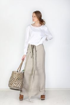 "Handmade with love and care Oeko-tex certified 100% linen skirt which is crafted by local tailors in Lithuania (EU member). It goes perfectly with any of our blouses (you will find below some recommendations)! Look sharp all day long! Details: *Colour shown: natural grey linen (1st picture) *Model is wearing size M *High-waisted *Pockets: no *Medium weight (185 g) *Not-ironed (and no need to) *Handcrafted by @LinenCloud Easy care: - Machine wash gentle - Dry gentle - Wash seperately or with sim Linen Wrap Skirt Outfit, Linen Wrap Skirt Pattern, Linen Skirt Outfit, Maxi Linen Skirt, Wrap Skirt Pattern, Linen Wrap Skirt, Long Linen Skirt, Skirt A Line, Linen Cardigan