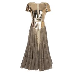 Paule Ka - Fishnet, taffeta and vinyl golden dress. Size 38FR. Additional information: Condition: Very good condition Dimensions: Shoulder width: 38 cm - Chest: 40 cm - Waist: 34 cm - Sleeve length: 17 cm - Length: 130 cm Seller Reference: VR365