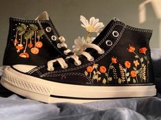 "* Product details:  \"Custom Embroidered Converse High Tops, 3D Embroidery Sweet Orange Flower Garden Shoes, Custom Design Sneakers, Christmas Shoes Gifts\" Shoe Type: Converse Chuck Taylor 1970s Shoe color: 3. Black_1970s Price includes: Shoes + Embroidery as shown * Custom embroidery: I was born and raised in a family with a long embroidery tradition in a small village. My family mainly embroideries traditional clothes. I want them to be different, I put that art into everyday use: shoes, t-s Summer Sneakers With Appliques And Round Toe, Spring Embroidered Sneakers, Embroidered Sneakers For Spring, Embroidered Closed Toe Sneakers For Spring, Low-top Appliqued Sneakers For Spring, Low-top Sneakers With Appliques For Spring, Spring Low-top Sneakers With Appliques, Low-top Applique Sneakers For Spring, Spring Embroidered Round Toe Sneakers