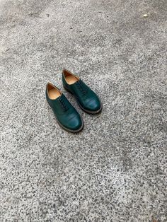 "These women's shoes, known as Brogue Oxfords Tie Shoes, are made of soft dark green leather, giving them a bold and unique look. The intricate brogue detailing on the leather adds a touch of sophistication and refinement to these women shoes, making them perfect for formal occasions or business settings. The shoes feature a comfortable rubber sole, making them versatile enough for any occasion, whether it's a casual weekend outing or a formal business meeting. With their striking dark green color and timeless brogue design, these shoes are sure to become a statement piece in any fashion-forward woman's wardrobe. Key features: 1. Handcrafted in our workshop in Kyiv. 2. Made from 100% natural soft leather. 3. Removable insole, so you can use your own orthopedic insole. 4. Fits true to size Green Leather Shoes With Leather Sole For Fall, Green Leather Shoes With Round Toe, Green Casual Oxfords With Round Toe, Casual Green Oxfords With Round Toe, Green Wingtip Oxfords For Formal Occasions, Green Leather Shoes For Fall, Green Round Toe Loafers For Fall, Wingtip Oxfords With Leather Footbed For Office, Office Wingtip Oxfords With Leather Footbed