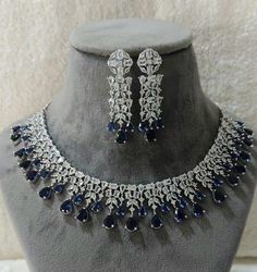 Silver Finish American Diamond and Sapphire Blue Stones Choker Necklace Set with Earrings Blue Teardrop Jewelry Sets For Formal Occasions, Blue Teardrop Necklace With Matching Earrings, Blue Dangle Necklaces For Formal Occasions, Blue Jewelry Sets With Matching Round Earrings, Blue Hand Set Jewelry For Party, Hand Set Blue Jewelry For Party, Blue Hand Set Necklaces For Party, Necklace Set With Earrings, Beautiful Tiaras