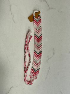 This bracelet has a Polka Dot Chevron pattern. It is about 11 inches long. Adjustable Band Bracelet As Fashion Accessory, Adjustable White Band Bracelet, Adjustable Pink Band Bracelet, White Adjustable Bracelet Wristlet, Adjustable Red Band Bracelets, Adjustable White Wristlet Bracelet, Chevron Bracelet, Falmouth, Braided Bracelets