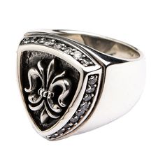 925 Sterling Silver Diamond Fleur De Lis Ring  100% solid 925 sterling silver  Stamp.925 trademark inside the band  Ring weight: 23g   Ring face measures: 21mm x 25mm  No. diamond clear stones: 25   A symbol of unity, this masculine dress ring features the recognisable symbol of the Fleur De Lis. Long since recognised in the Catholic church, this three leaf lily has been bound together to symbol a united front within French history. Here, it sits proudly from a darkened silver shield background Classic Silver Engraved Ring With Diamond Accents, Classic Silver Rings With Diamond Accents, Classic Silver Diamond Ring Engraved, Diamond Rings Symbolic For Formal Occasions, Formal Symbolic Diamond Ring, Symbolic Diamond Ring For Formal Occasions, Silver Signet Ring With Diamond Accents, Silver Diamond Engraved Signet Ring, Silver Signet Ring With Diamond Accents For Promise