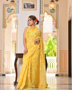 Premium Semi Georgette Full Chikankari Embroidered  Saree Fabric: Faux Georgette   Length: 6.5 metres (blouse inclusive) Color: Sunshine Yellow Saree Includes Blouse in same color with chikankari Work Work: Chikankari Shaded work done intricately all over the sari with motifs of flower and Paisley. 100% hand embroidered  Full Chikankari Embroidery Thread: Cotton White Thread Use bags to safeguard your sarees Note: motifs may vary for each sarees. There might be a 10-15% difference in colour due Yellow Chikankari Embroidered Traditional Wear In Georgette, Chikankari Embroidery Georgette Saree For Puja, Chikankari Embroidery Georgette Traditional Wear For Puja, Chikankari Embroidery Georgette Kurta For Puja, Yellow Chikankari Traditional Wear In Georgette, Yellow Unstitched Chikankari Blouse Piece, Yellow Unstitched Blouse With Chikankari Embroidery, Yellow Semi-stitched Blouse With Chikankari Embroidery, Yellow Chikankari Embroidery Georgette Saree