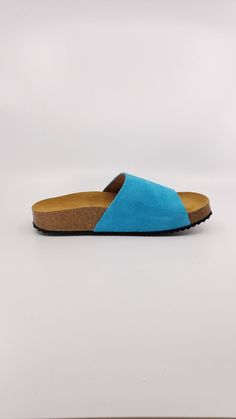 The Flat - Turquese - Slip on sandals with suede upper is your go to for everyday walking. Upper: Suede Leather Sole: EVA Platform heel: 55mm Made in Spain Beach Sandals With Suede And Leather Sole, Beach Suede Mules With Leather Footbed, Suede Sandals With Leather Sole For Beach, Suede Slides With Round Toe And Suede Lining, Summer Suede Footbed Sandals With Suede Lining, Suede Footbed Sandals With Leather Sole And Round Toe, Suede Footbed Sandals With Suede Lining For Summer, Suede Mules With Textured Footbed For Beach, Suede Sandals With Leather Sole And Closed Toe