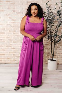 Grab yours now with $10 off - use code 10OFFNOW

Social Graces Wide Leg Jumpsuit, You'll be big on our Social Graces Jumpsuit! Crafted from a woven fabric with a smocked elastic bodice and functional shoulder straps, this jumpsuit is both stylish and comfortable. The functional patch pockets and elastic waistline add convenience, while the lined pant ensures a comfortable fit. Be the life of the party in this wide leg jumpsuit!

* Woven

* Smocked Elastic Bodice
* Functional Shoulder
* Elast… Social Graces, Life Of The Party, Judy Blue Jeans, Wide Leg Jumpsuit, Dress Romper, Hat Hairstyles, Dress Accessories, Long Tops, Boutique Clothing