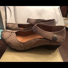 Taos Footwear, Brand New. Light Grey On Box / May Look Closer To Taupe. Velcro Strap. Cut Design In Leather . Beautiful Metal “ Button “ On Strap Taos, Velcro Straps, Metal Buttons, Cut Design, Tao, Light Grey, Size 7, Women Accessories, Women Shoes