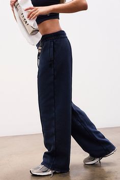 These flattering straight-leg pants are a must-have for your off-duty routine. Featuring a super soft jersey fabrication and drawstring adjustable waistband for a just-right fit. **Fit:** Relaxed fit; runs slightly long; wide leg **Features:** Soft, jersey fabrication is lightweight; fabric drapes down leg; drawstring adjustable waistband; side seam pockets; high-rise **Why We | Sprint To The Finish Straight Leg Pants by FP Movement at Free People, Midnight Navy, L Athleisure Straight Leg Bottoms For Elevated Casual, Sporty Drawstring Pants With Straight Hem, Athleisure Straight Leg Sweatpants With Drawstring, Athleisure Straight Leg Drawstring Sweatpants, Sporty Straight Sweatpants For Elevated Casual Occasions, Workwear Athleisure Straight Leg Joggers, Athleisure Straight Leg Joggers For Workwear, Sporty Straight Leg Sweatpants For Work, Sporty Straight Leg Bottoms With 4-way Stretch