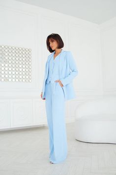 Fabric: crepe ﻿﻿Viscose 50%, Polyester 40%, Elastane 10% ﻿﻿Peak lapel ﻿﻿Oversized blazer (1 button) ﻿﻿Wide-leg pants ﻿﻿Included: blazer, vest, pants Chic Semi-formal Pantsuit With Notch Lapel, Business Casual Tuxedo Pantsuit With Notch Lapel, Business Casual Notch Lapel Pantsuit With Pressed Crease, Business Casual Pantsuit With Notch Lapel And Pressed Crease, Chic Suits With Pressed Crease For Career, Three-piece Suit For Business Casual In Spring, Spring Three-piece Suit With Notch Lapel For Work, Chic Three-piece Suit With Notch Lapel For Formal Occasions, Chic Notch Lapel Suits For Office