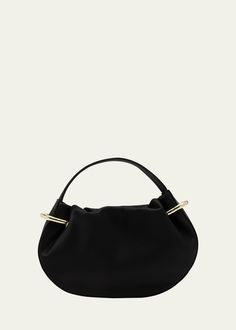 "Find ULLA JOHNSON Tilda Mini Ruched Top-handle Bag on Editorialist. Ulla Johnson \"Tilda\" top handle bag in ruched leather, cotton, and polyester Flat top handle Detachable shoulder strap Can be worn as a top handle or shoulder bag Open top with magnetic closure Exterior, golden ring accents Approx. 9.3\"H x 9.8\"W x 2.3\"D Professional cleaning recommended Made in Italy" Chic Top Handle Baguette Bag, Chic Evening Hobo Bag With Top Handle, Chic Baguette Bag With Top Round Handle, Evening Hobo Bag With Detachable Handle, Chic Baguette Bag With Round Top Carry Handle, Chic Handheld Hobo Bag For Evening, Evening Hobo Bag With Top Carry Handle, Evening Hobo Bag With Handle Drop, Evening Baguette Bag With Top Handle