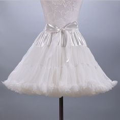 FREE SHIPPING ON ORDERS OVER $100 USDDue to high demand please allow 3-4 weeks for shipping! This gorgeous super puffy mini petticoat is so soft, comfortable and adds amazing volume to any outfit or costume. Perfect for face painters, balloon twisters and fairies. These mini petticoats go perfectly over leggings and the short length allows you the option to sit down comfortably while entertaining. Features 3 layer petticoat with 2 super puffy, soft, high volume tulle layers with ruffled edges an Rockabilly Women, Ballet Dancewear, Tutu Skirt Women, Skirt Tutu, Tulle Tutu Skirt, Tulle Tutu, Party Skirt, Chiffon Skirt, Tutu Skirt