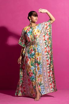 Explore elegance in a chanderi printed kaftan, meticulously handcrafted from cotton silk. Adorned with a hand-painted floral jaal on the chanderi base, this relaxed-fit garment combines comfort with sophisticated style. Navratri Silk Dress With Digital Print, Silk Kurta With Floral Print In Maxi Length, Silk Maxi Kurta With Floral Print, Festive Multicolor Printed Kaftan, Spring Silk Kaftan With Printed Motifs, Festive Multicolor Silk Kaftan, Bollywood Style Multicolor Straight Kurta Kaftan, Festive Floral Print Maxi Kaftan, Festive Silk Dress With Vibrant Print