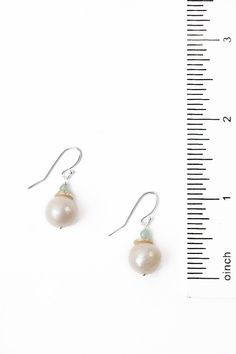 The Serenity Collection is beloved classic line from Anne Vaughan Designs. These mindfully crafted earrings are ideal for pairing with other items from the collection. Sterling Silver (nickel and lead-safe) Freshwater Pearl, Chalcedony 1", with sterling silver ear wires We hand select our natural materials, thus there may be slight variations in color and/or size that will not detract from the overall aesthetic Our unique handcrafted designer jewelry for women is made in America, each design cre Gift Pearl Earrings With French Hook, Sterling Silver Pear Shaped Pearl Earrings, Elegant Sterling Silver Pearl Earrings Nickel Free, Elegant Sterling Silver Nickel-free Pearl Earrings, Classic Sterling Silver Nickel-free Pearl Earrings, Classic Nickel-free Sterling Silver Pearl Earrings, French Hook Pearl Drop Earrings For Gift, Nickel Free Pear-shaped Silver Earrings, Sterling Silver Pearl Earrings With French Hook