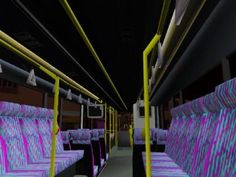 an empty bus with purple and green seats