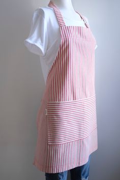 the apron is red and white striped