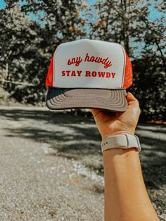 Make any night out or any errand-run a party with this fun Say Howdy, Stay Rowdy Hat! Crafted from 100% nylon mesh, it's perfect for bachelorettes, girls night out, or just a little sassy flair any time you're out and about. Get ready to let the good times roll! (And drink responsibly!) Nashville Style Trucker Hat | Bachelorette Girls Weekend Hat | Cowgirl Style | Trucker Hat Girl Trucker, Funny Trucker Hat, Drink Responsibly, Custom Trucker Hats, Fringe Crossbody Bag, Nashville Style, Funny Hats, Let The Good Times Roll, Hat Ideas