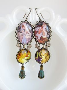 Mucha Cameo Earrings in Brass, Czech Glass // Statement Jewelry, Fine Art Jewelry - Etsy Bohemian Cabochon Earrings For Gift, Bohemian Cabochon Earrings As Gift, Vintage Dangle Earrings With Artistic Design, Vintage Earrings With Artistic Design For Gift, Vintage Earrings With Artistic Design As Gift, Vintage Artistic Design Earrings As A Gift, Bohemian Hand Painted Brass Jewelry, Vintage Bronze Jewelry With Artistic Design, Vintage Hand Painted Drop Earrings