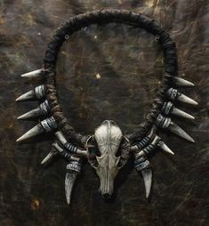 Embrace your inner mystic with the Shaman Necklace, a captivating piece that exudes an aura of ancient wisdom and connection to the spiritual realm. Crafted with intricate details and adorned with bones and fangs, this striking necklace is perfect for LARP events, fantasy gatherings, or as a unique cinema costume accessory. Whether you're attending ConQuest of Mythodea or adding a touch of post-apocalyptic flair to your outfit, this large neck jewelry is a statement piece that will appeal to hor Cinema Costume, Shaman Costume, Shaman Necklace, Fox Skull, Spiritual Realm, Neck Jewelry, Horror Lovers, Bone Necklace, Bone Jewelry