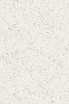 a white wallpaper with flowers and leaves in the middle, on top of it