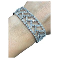 This stunning 1990s Tiffany & Co platinum and diamond bracelet is made up of approximately 14 carats F colour VVS2 diamonds. It has a matching choker necklace which is listed separately on 1stDibs. Tiffany Diamond, Aquamarine Necklace, White Diamond Ring, Gilded Age, Platinum Engagement Rings, Tiffany And Co, Engagement Ring Styles, Diamond Bracelets, Diamond Design