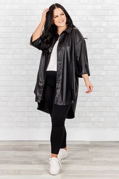 We speak the truth when we say you would AMAZING in this top! With the ability to be worn open over a solid top and leggings for a lightweight jacket look, or buttoned up with skinnies and accessories for a classic style, this top offers endless possibilities! Its timeless black color adds a touch of sophistication to any outfit! 100% Polyester Versatile Black Blouse For Fall, Versatile Black Fall Blouse, Sleek Button-up Tops For Fall, Sleek Button-up Fall Tops, Sleek Fall Button-up Tops, Black Button-up Outerwear For Day Out, Speak The Truth, Model Fits, Tunic Blouse