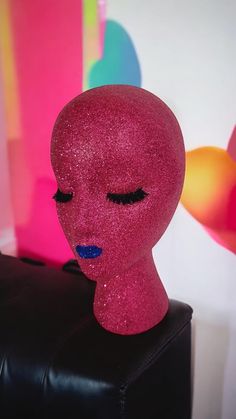 Female styrofoam mannequin head. Great for displaying wigs, hats, sunglasses, scarves, tiaras, headbands, crowns, beanies, or can be used for decoration or just create your own idea for use. She adds character and fashion to wigs, headbands, hats, etc. The measurements are (LxHxW) 6 1/2"x11 3/8"x6" (Approx.) All mannequin heads are covered with sparkling glitter that does not come off and wears lipstick and eyelashes.  Our signature Mannequin head collection. Introducing: PINKY Foam Head, Hat Display, Mannequin Head, Beautiful Wigs, Wig Caps, Mannequin Heads, Sparkles Glitter, Tiara, Eyelashes