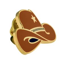 Our Cowboy Hat Pin is perfect for any cowgirl or cowboy, or simply anyone wanting to show some Southwestern spirit! The hat is brown with a gold star and is the ideal addition to any bag, lapel, or even your own cowboy hat (or beanie, or baseball hat - you name it!) It is made using the jewelry-quality cloisonn process, is enamel color filled, gold plated, and polished smooth to the touch. Each pin has a standard clutch back and comes individually poly bagged. Yeehaw! Western Gold Hat Band For Rodeo, Gold Western Hat Band For Western-themed Events, Gold Country Style Hat For Rodeo, Gold Western-style Hat Band For Western-themed Events, Country-style Gold Hat For Rodeo, Gold Hat With Curved Brim For Western-themed Events, Gold Western Hat For Country Events, Gold Country Style Hat Bands For Country Events, The Cowboy