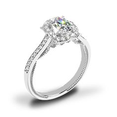 a diamond engagement ring on a white background