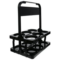 a black cart with four trays on it