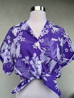 "Like new vintage Hawaiian button shirt sleeve crop top with tie at waist. Short sleeve with collar and front pocket. Size small fits chest 36\" with a length of 18.5\". Made in USA" Flower Print Clothes, Purple Tropical, Vintage Hawaiian Shirts, Dress Inspo, Vintage Hawaiian, Tie Blouse, Tropical Floral, Outer Banks, Pocket Size