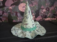 Floral witches hat. One size fit most. approximate 10 in circumference, pretty and simple, a fun hat to wear in the garden, or for those tea parties you want to stand out in.   * More fabric choices to come, more options to come soon! * Please message me for personalization. Please remember I am a small shop; I will work with you on a personal level to help you get the witch hat you need! **Purchaser assumes all responsibility for safely using product.  By purchasing this product, the customer a Fitted Witchy Hat With Curved Brim, Witchy Fitted Hat With Curved Brim, Whimsical Bucket Sun Hat, Whimsical Sun Hat With Curved Brim For Festivals, Whimsical Wide Brim Sun Hat For Festivals, Whimsical Wide Brim Costume Hat For Garden Party, Whimsical Brimmed Sun Hat, Whimsical Wide Brim Hat For Garden Party, Whimsical Wide-brim Hat For Garden Party